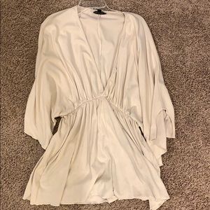 Low cut cream romper